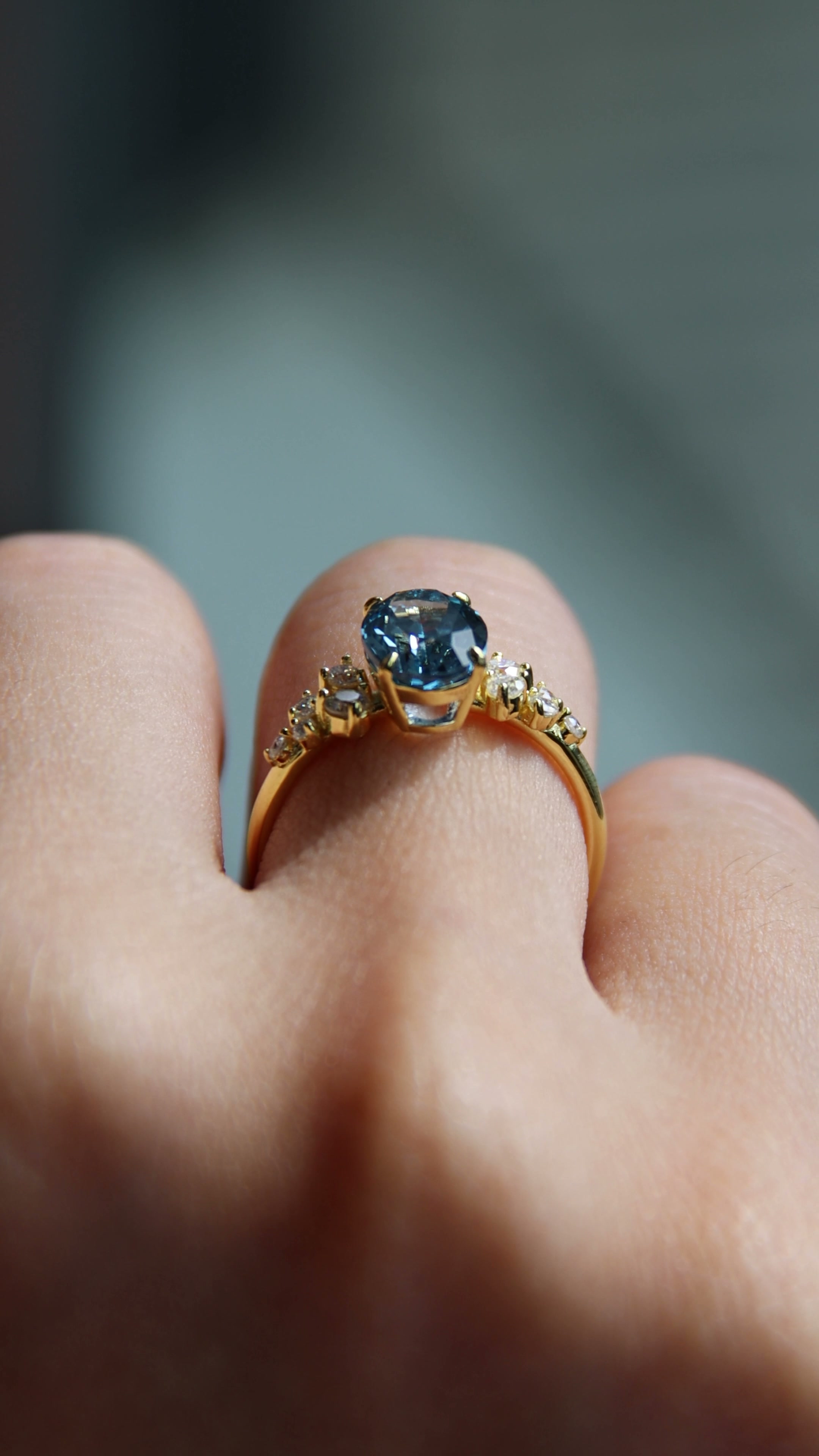 A close-up of a ring worn on a hand