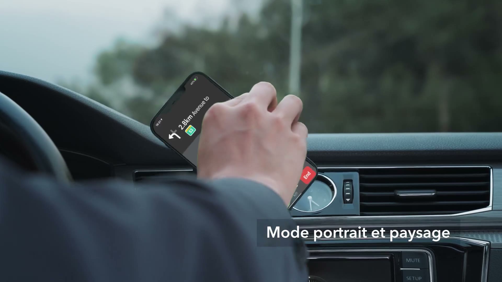 A phone being adjusted on a car air-vent mount